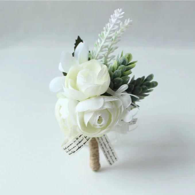 Artificial floral wedding buttonhole with ribbon finish