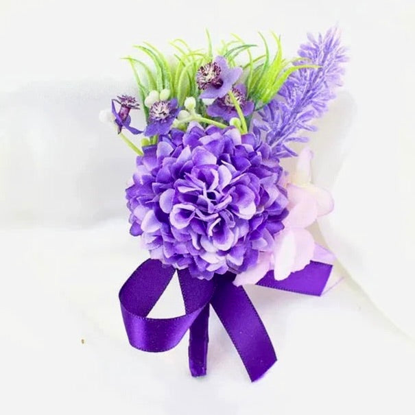 Artificial floral wedding buttonhole with ribbon finish