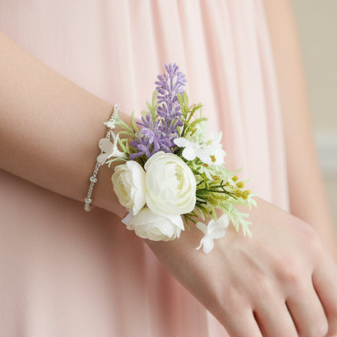 Floral wedding wrist corsage for guests and bridal party