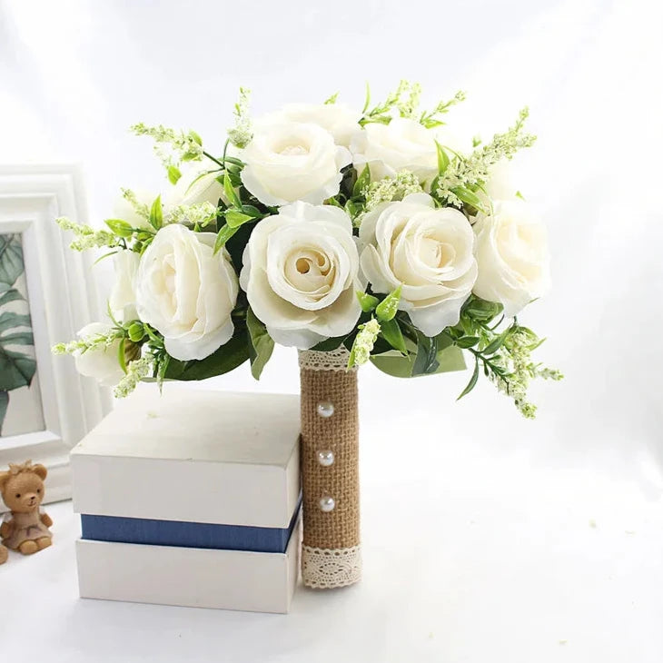 White artificial wedding bouquet with lifelike roses in hessian finish
