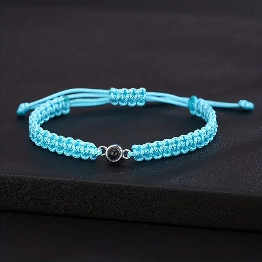 Love You in 100 Languages bracelet – projection jewellery gifts, available with teal cord.