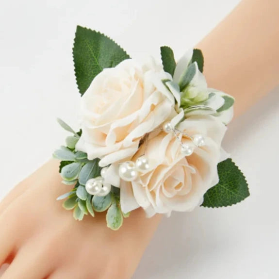Artificial floral wedding wrist corsage on faux pearl bead bracelet