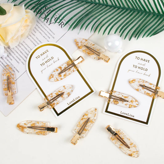 Various Pairs of Gold Bridal Party Make-up Hair Setting Clips on sentimental gift card