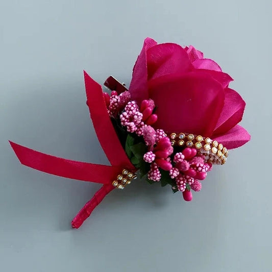 Artificial floral wedding buttonhole with ribbon finish