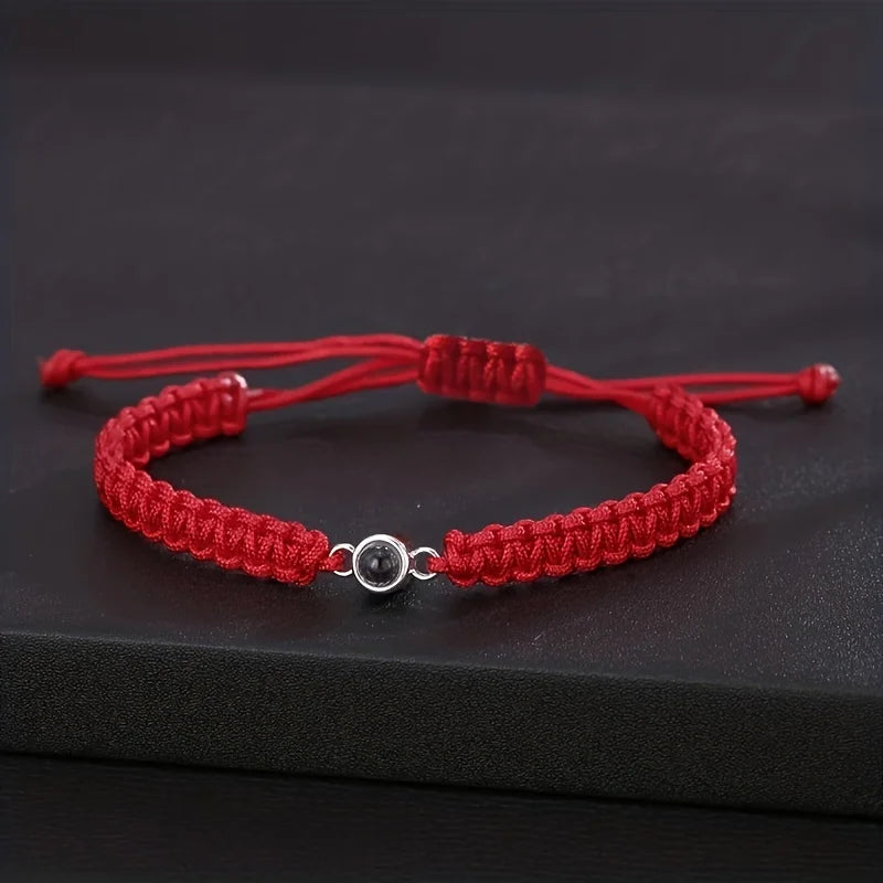 Love You in 100 Languages bracelet – projection jewellery gifts, available with red cord.