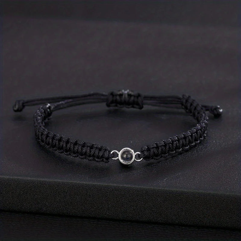 Love You in 100 Languages bracelet – projection jewellery gifts, available with black cord.
