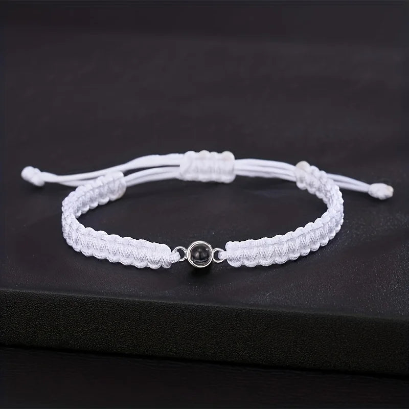 Love You in 100 Languages bracelet – projection jewellery gifts, available with white cord.