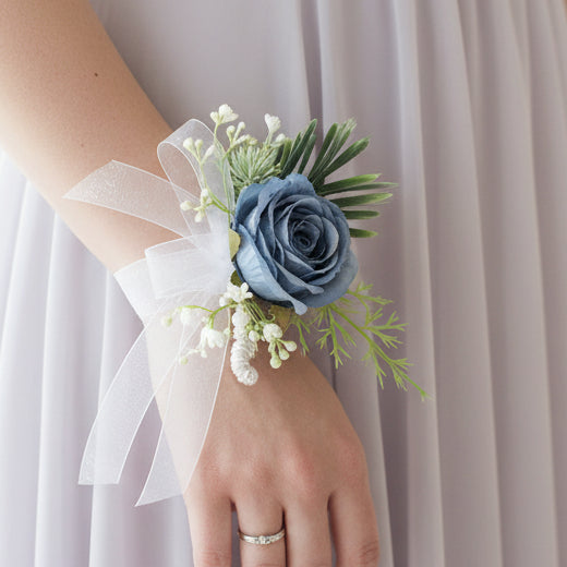 Floral wedding wrist corsage for guests and bridal party