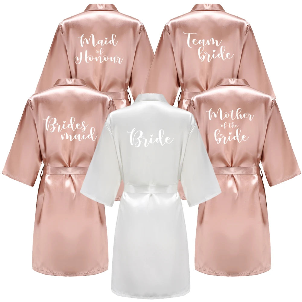 Rose gold bridal party robes with Bride, Bridesmaid & Maid of Honour titles
