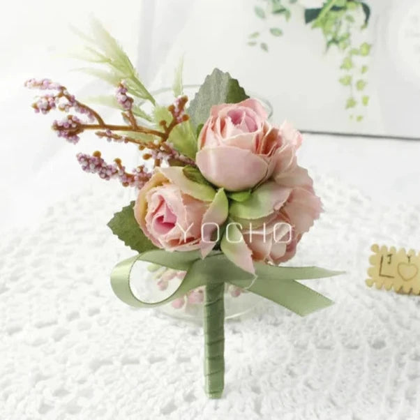 Artificial floral wedding buttonhole with ribbon finish