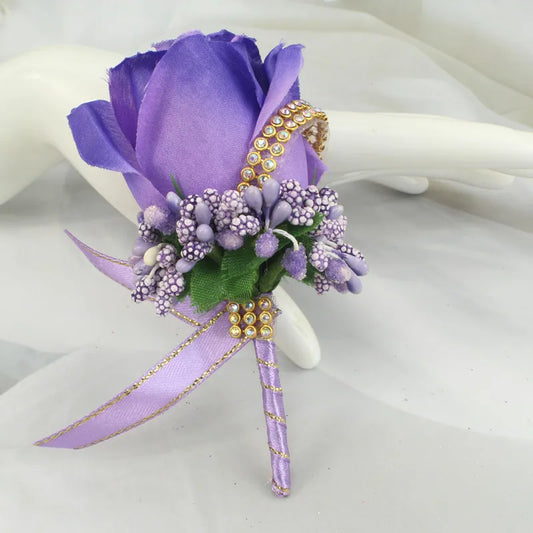 Artificial floral wedding buttonhole with ribbon finish