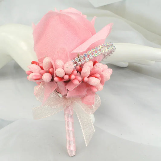 Artificial floral wedding buttonhole with ribbon finish