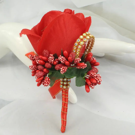 Artificial floral wedding buttonhole with ribbon finish