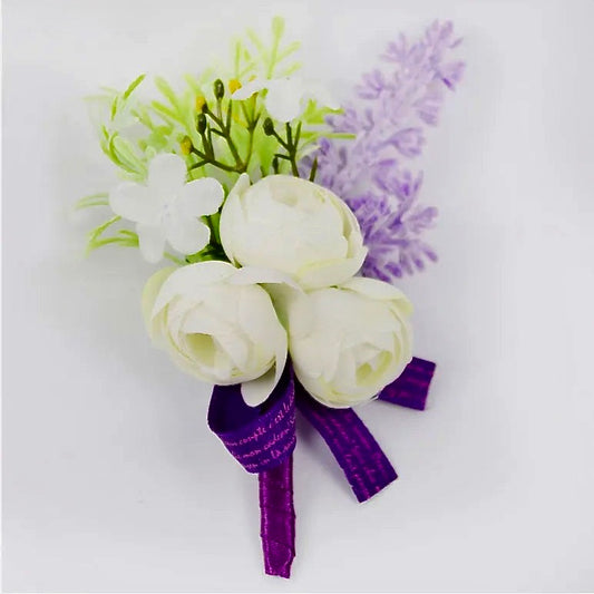 Artificial floral wedding buttonhole with ribbon finish
