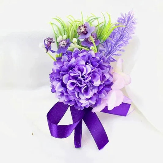 Artificial floral wedding buttonhole with ribbon finish