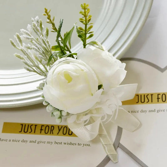 Artificial floral wedding buttonhole with ribbon finish