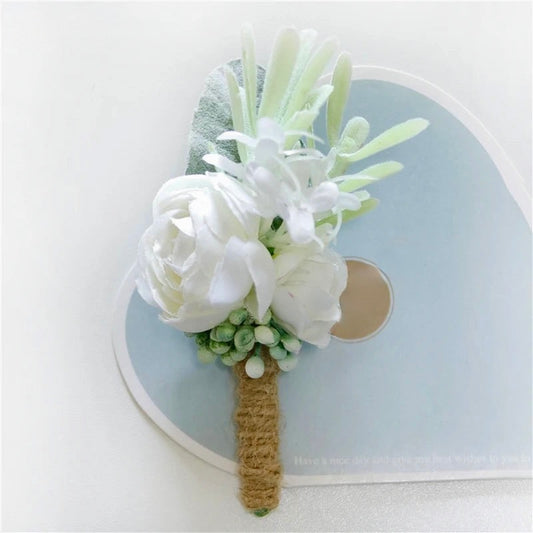 Artificial floral wedding buttonhole with ribbon finish