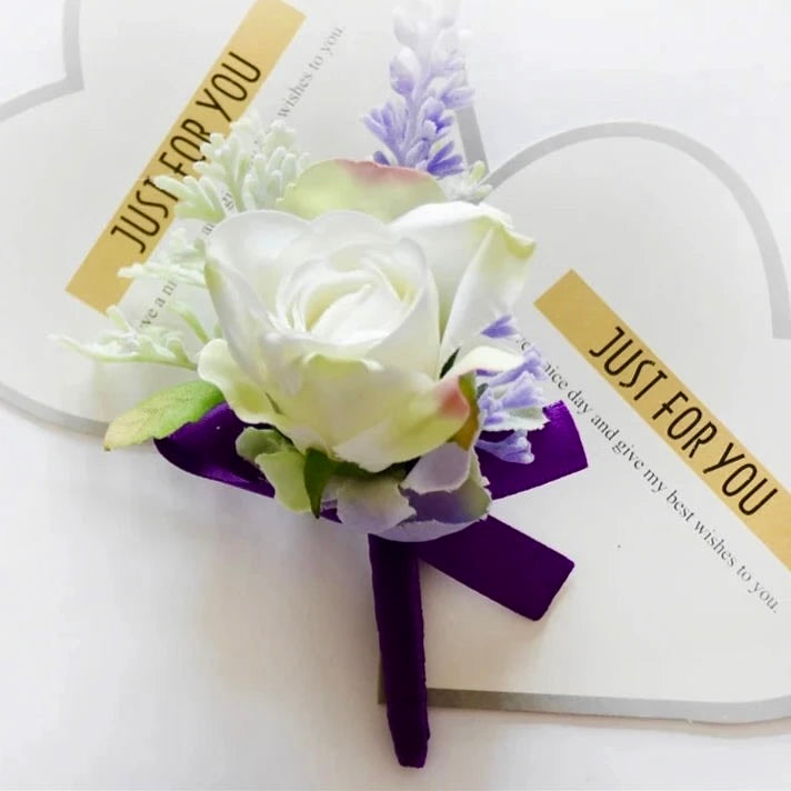 White and Purple artificial floral wedding buttonhole with ribbon finish