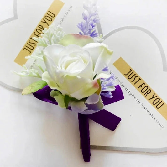 White and Purple artificial floral wedding buttonhole with ribbon finish