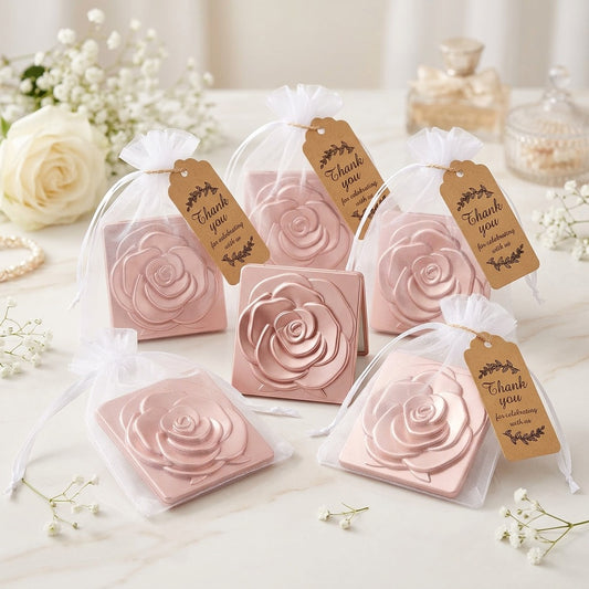 Pink rose-shaped folding makeup mirrors in clear bags with 'Thank you' tags on a floral background