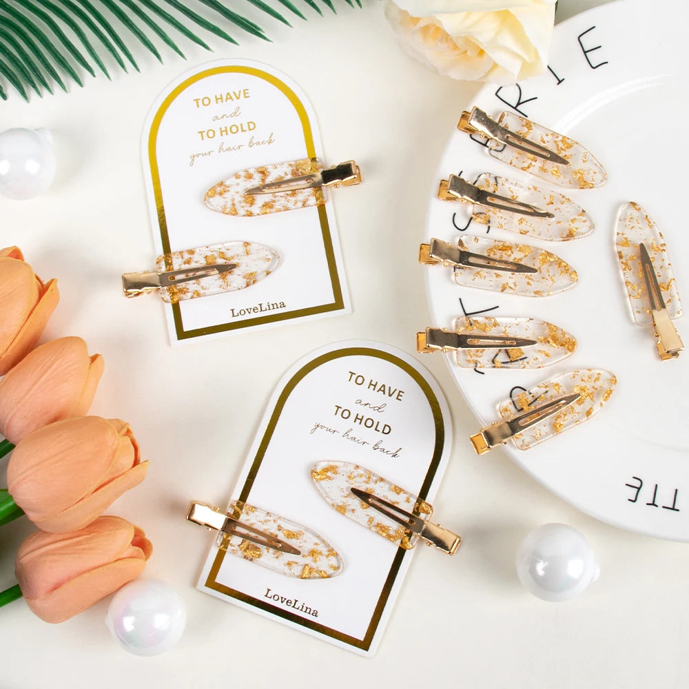 Various Pairs of Gold Bridal Party Make-up Hair Setting Clips on sentimental gift card