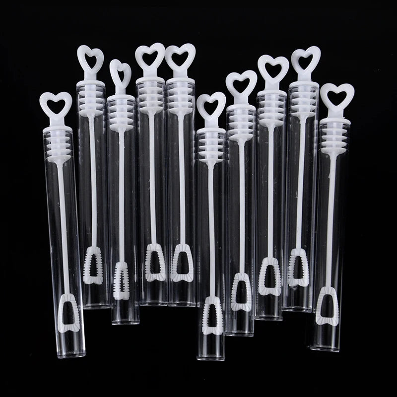 Mini bubble wand wedding favours with white heart-topped handles