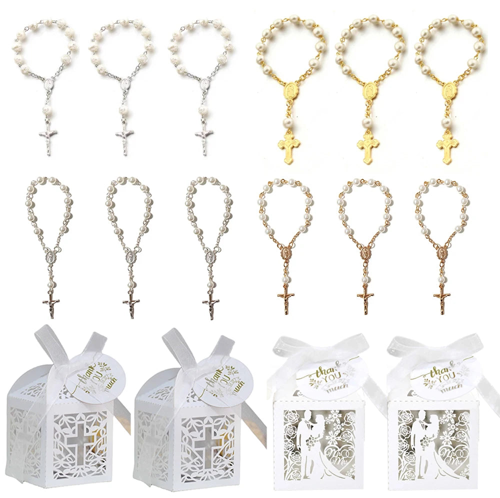 Gold and silver cross rosary bead wedding favours in gift boxes