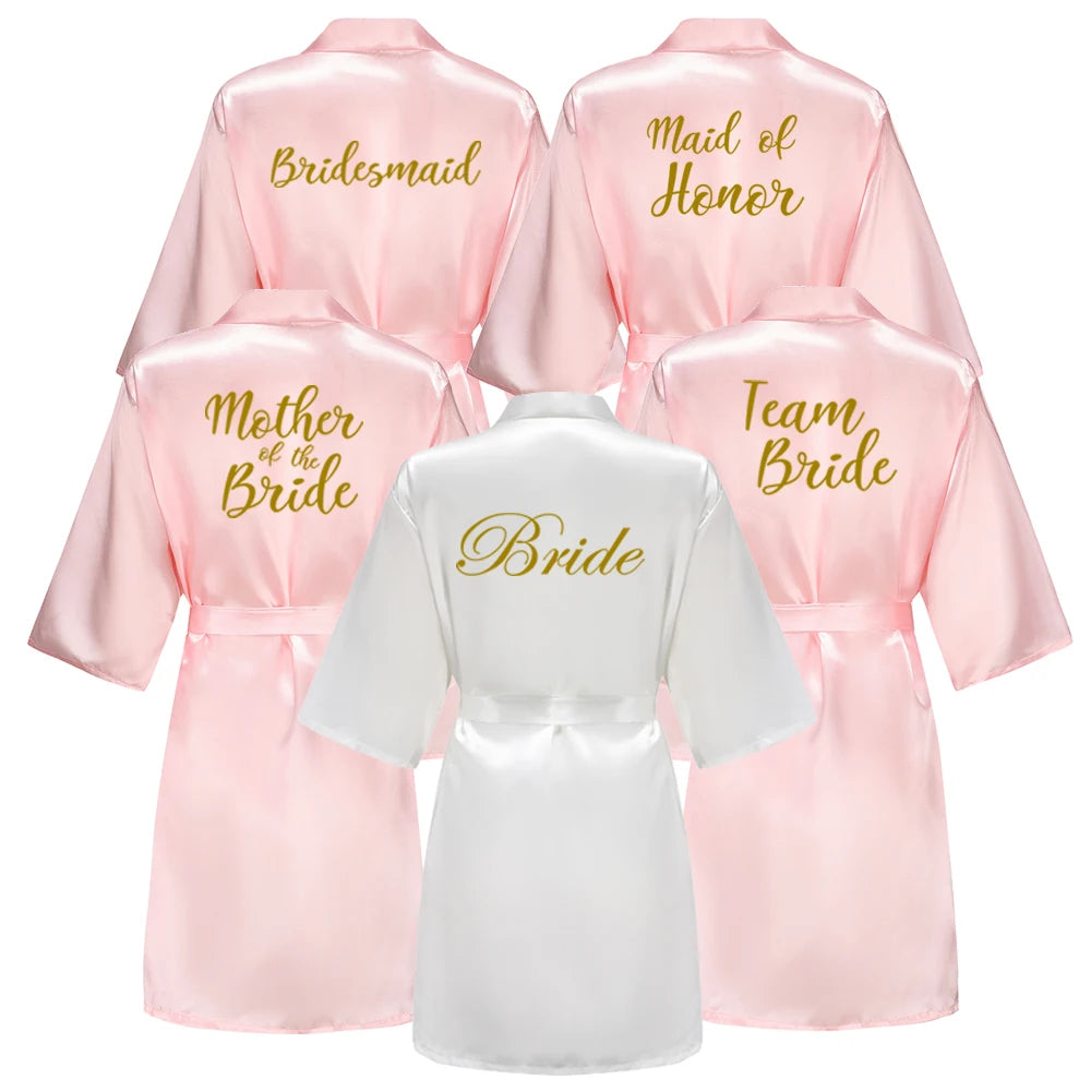 Baby pink bridal party robes with Bride, Bridesmaid & Maid of Honour titles