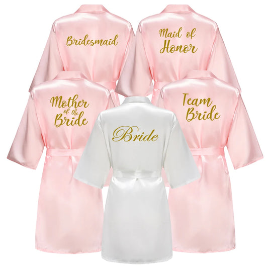 Baby pink bridal party robes with Bride, Bridesmaid & Maid of Honour titles