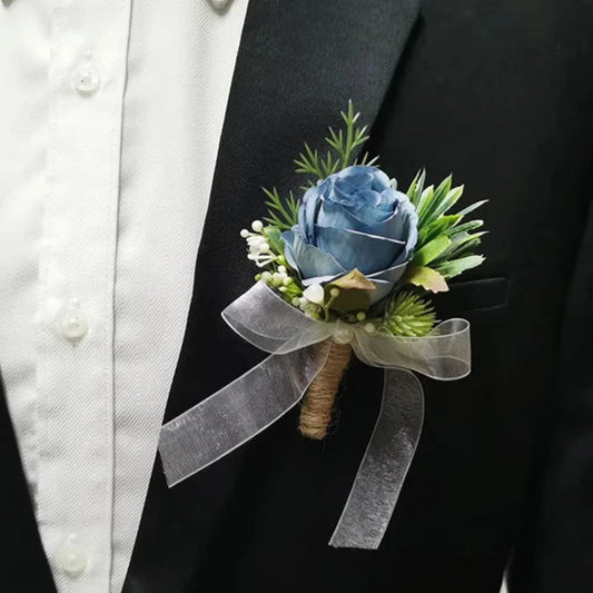 Artificial floral wedding buttonhole with ribbon finish