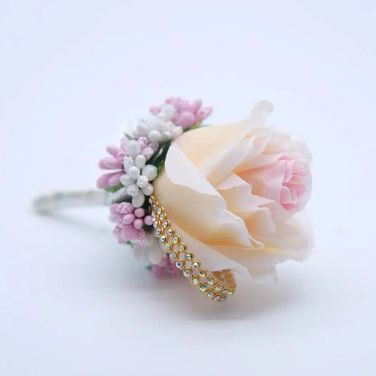 Champagne artificial floral wedding buttonhole with ribbon finish