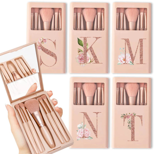 Pink makeup brush set with mirror and floral initial case