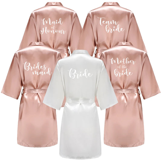 Rose gold bridal party robes with Bride, Bridesmaid & Maid of Honour titles