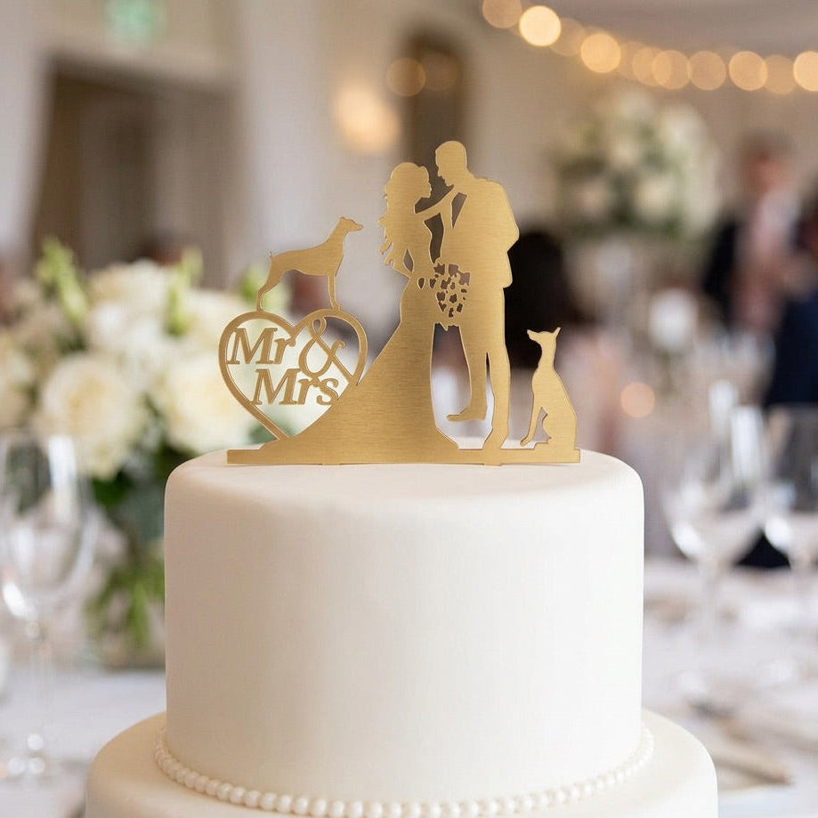 Wedding cake with 'Mr & Mrs' topper in a festive indoor setting